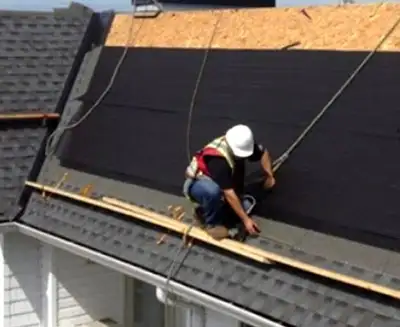 Ready Roofers working on a residential roof in Orillia