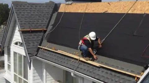 Roof repair work in progress